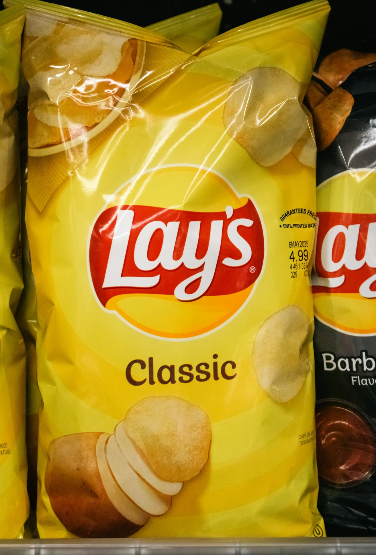 A bag of lay's classic potato chips.